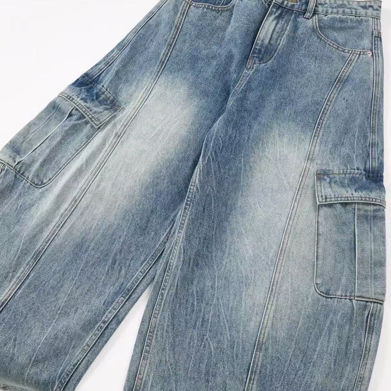 Side view of light blue cargo jeans with large flap pocket and wide leg