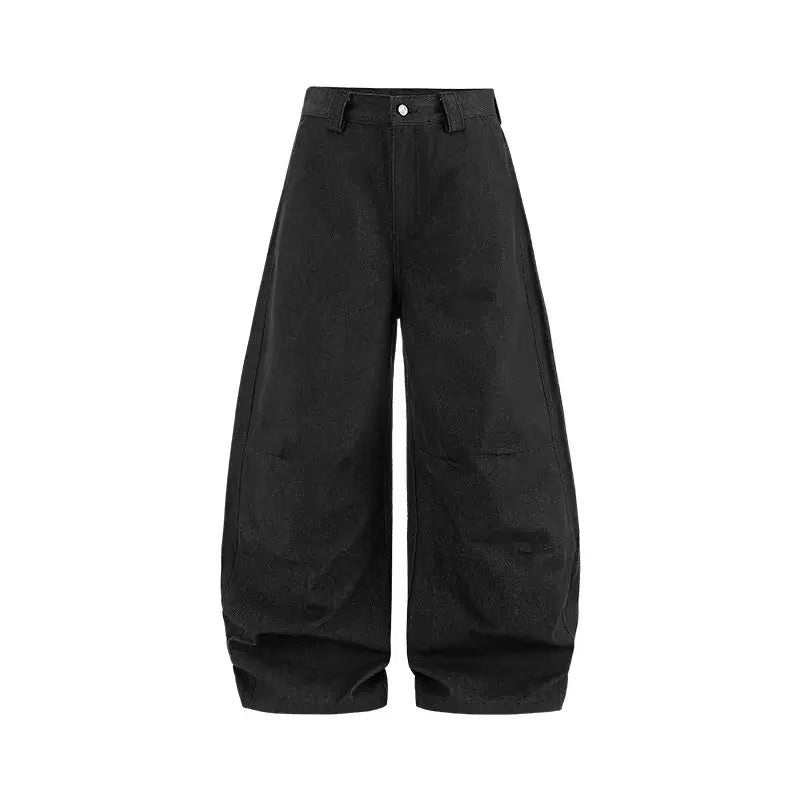 Black balloon wide-leg pants with exaggerated rounded silhouette, structured seams, and cinched hem on white background