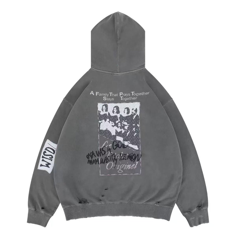 Gray distressed graphic hoodie with back print, hood up and worn holes near the hem