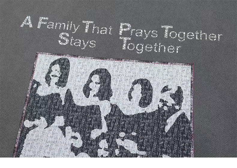 Back print close-up on gray hoodie showing text and faded family graphic