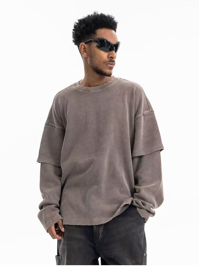 Taupe crewneck sweatshirt front view with relaxed fit and layered sleeves