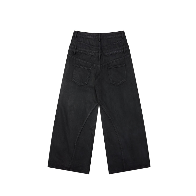 Back view of black wide-leg jeans showing double waistband and two back patch pockets