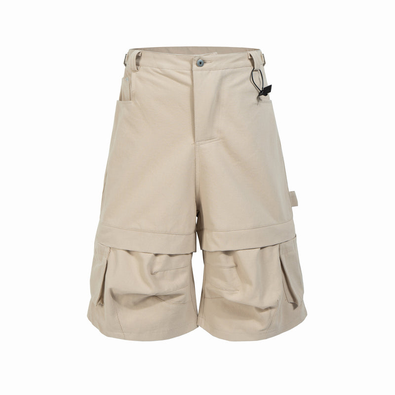 Beige cargo shorts with belt detail and layered lower panels, front view