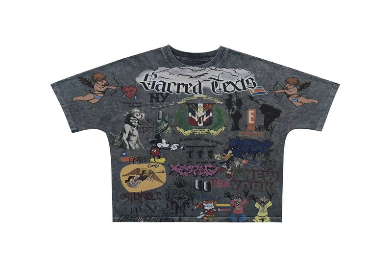 Vintage wash graphic tee with Sacred Chaos collage print, cherubs, cartoon characters, and bold streetwear text