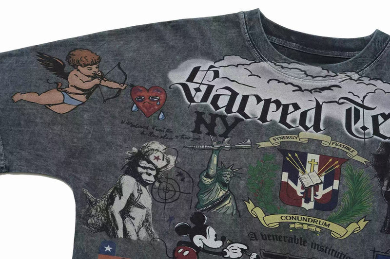 Vintage wash graphic tee with Sacred Chaos collage print, angel and cherub artwork, and gothic-style lettering