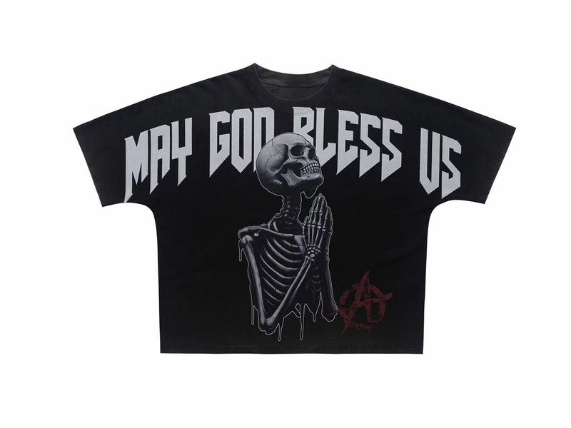 Black oversized gothic tee with praying skeleton graphic and bold May God Bless Us lettering