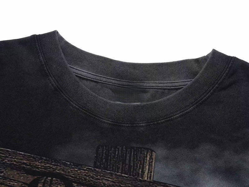 Black gothic graphic tee with a ribbed crew neck and dark skull print on soft streetwear cotton fabric