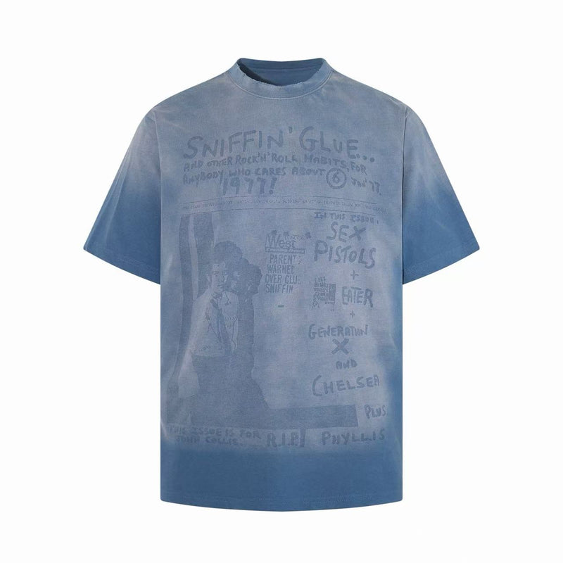 Blue washed oversized graphic T-shirt with faded Sniffin' Glue punk zine print and relaxed crew neck silhouette