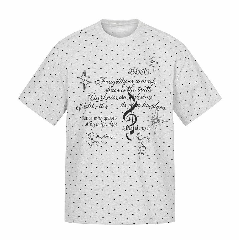 Light gray relaxed tee with allover micro hearts and gothic script graphic on the chest