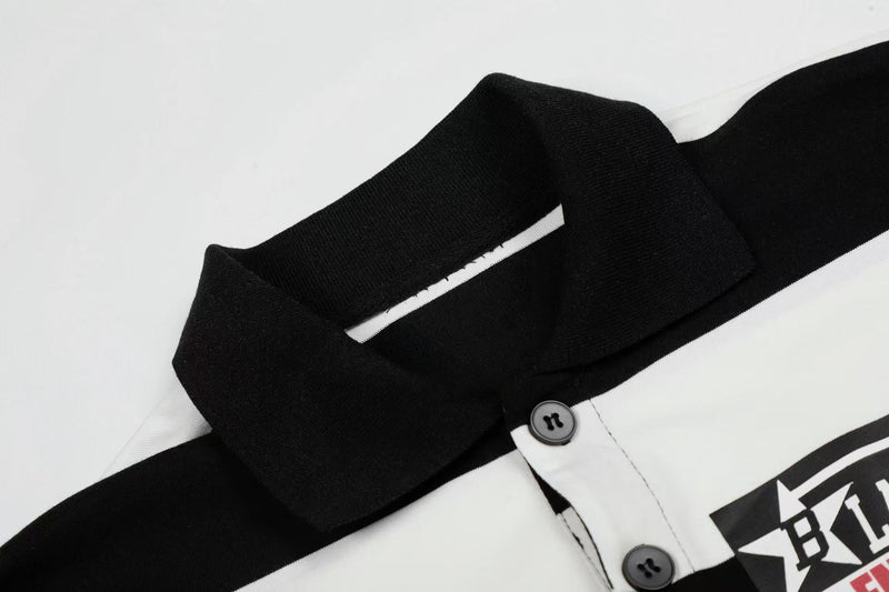 Black and white rugby stripe graphic polo shirt with button placket and bold chest logo detail