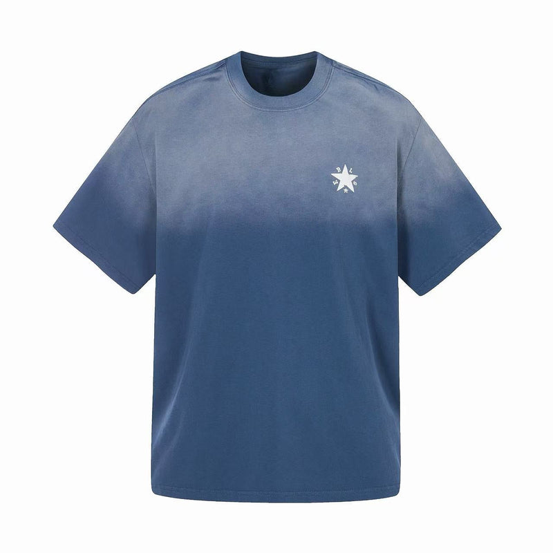 Blue gradient washed cotton tee with a small star graphic on the chest and relaxed short sleeves