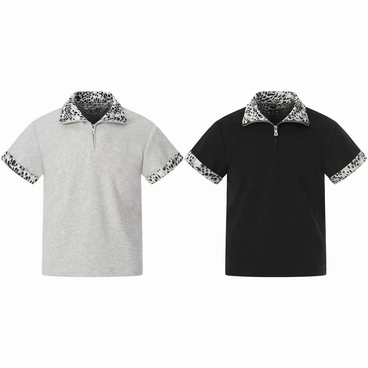 Black short-sleeve quarter-zip polo shirt with leopard print collar and sleeve trim on white background