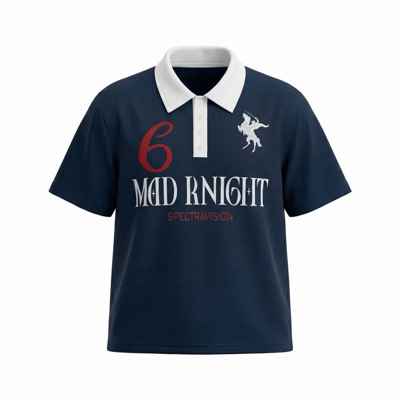 Navy graphic polo tee with white contrast collar, button placket, and bold Mad Knight print on the chest