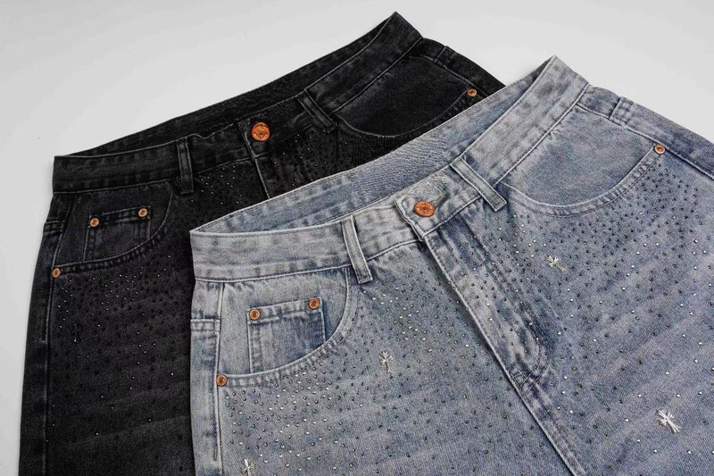 Black and light wash rhinestone jeans shown side by side at the waist