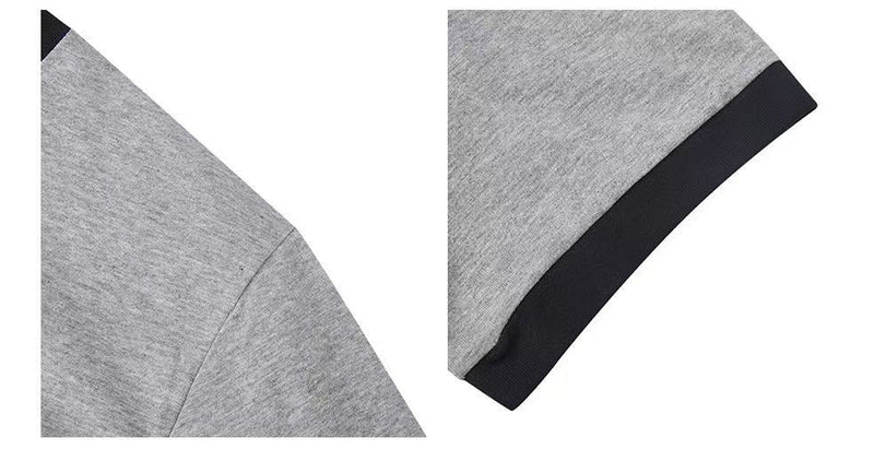 Close-up of a gray vintage ringer T-shirt with black trim and soft heathered fabric detail