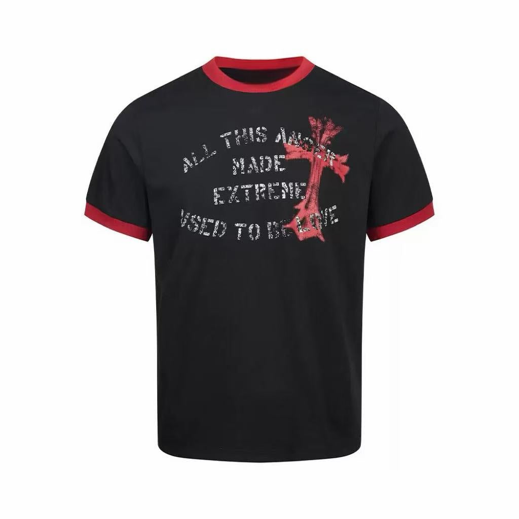 Black ringer t-shirt with red contrast collar and cuffs featuring a distressed cross graphic and arched vintage lettering on