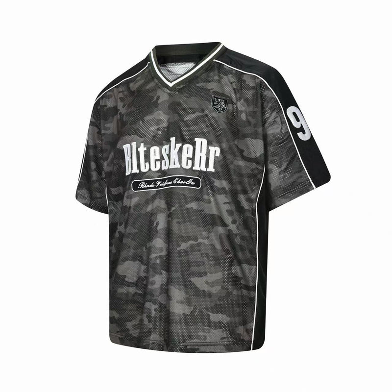Dark camo mesh football jersey with white trim, V-neck, bold front logo and number 9 on the sleeve