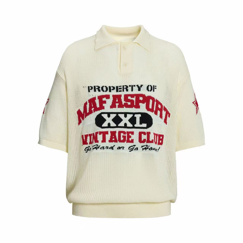 Cream knit polo shirt with bold varsity-style graphic text and relaxed collegiate streetwear fit