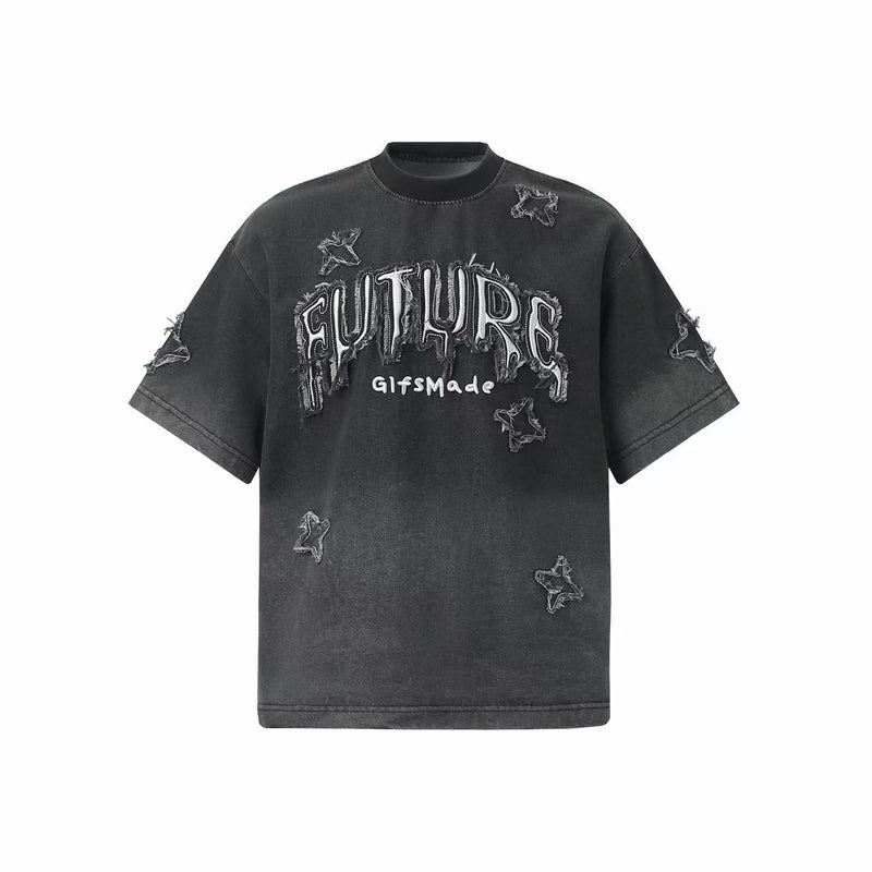 Black vintage-washed T-shirt with distressed star patches and faded FUTURE graphic streetwear design