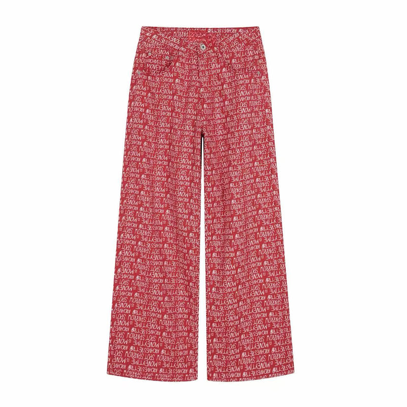 Red wide-leg pants covered in white script print, front view
