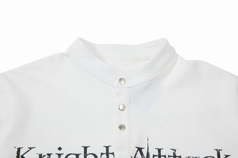 White snap-button polo tee with distressed black knight graphic and ribbed collar in a streetwear style