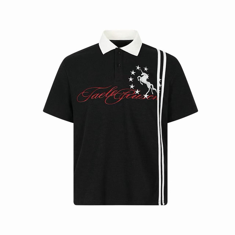 Black polo tee with white collar, script logo, star graphic, and side stripes in a streetwear style