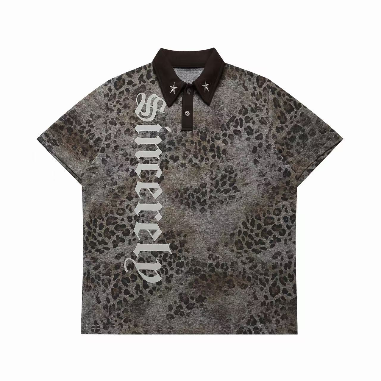Oversized grey leopard print polo shirt with gothic lettering graphic and metallic star collar pins, front view
