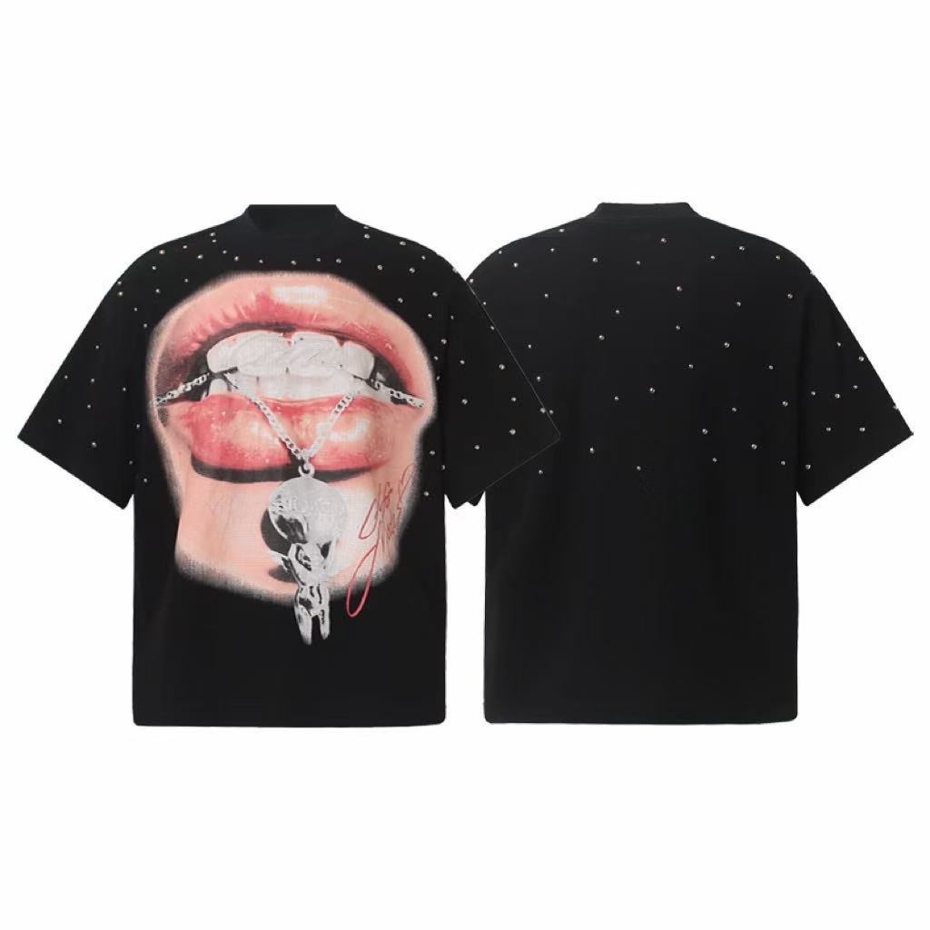 Black oversized graphic tee with large airbrushed lip print, silver chain pendant artwork, and all-over rhinestone embellishm