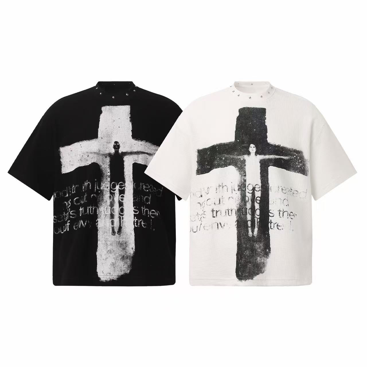 Oversized black gothic cross graphic tee with distressed typography print and metal stud collar detail, flat lay product shot