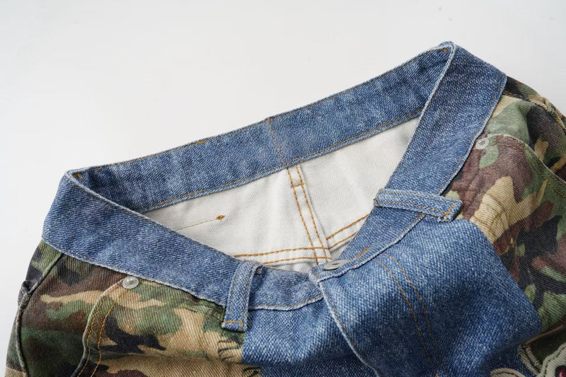 Close-up of waistband and white inner lining on blue denim and camouflage jorts