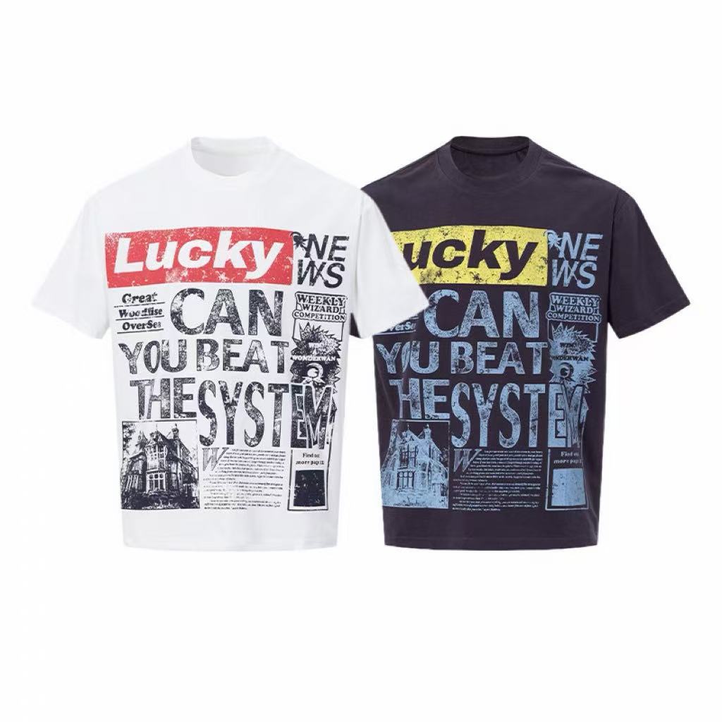 White oversized Lucky System newspaper graphic tee with distressed typography and red masthead print
