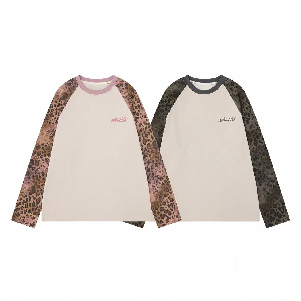 Oversized cream long sleeve raglan tee with pink-toned washed leopard print sleeves and lilac ribbed collar