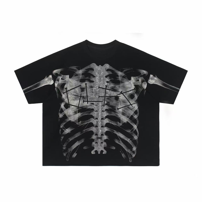 Black oversized graphic tee with a large distressed x-ray skeleton chest print and cyber-grunge style