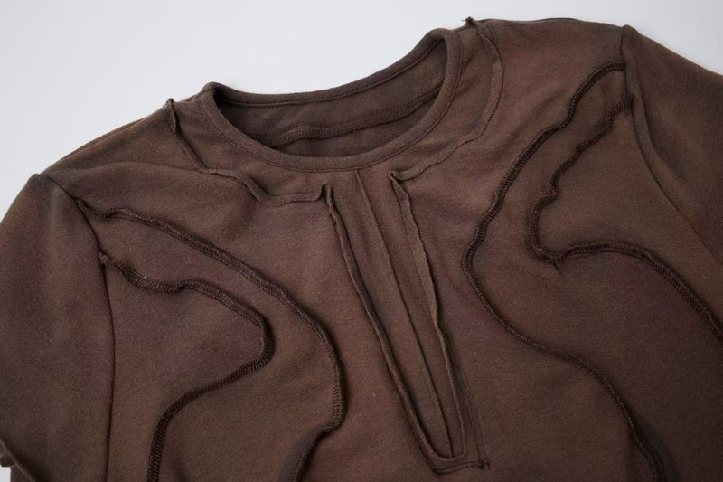 Brown sculpted cotton tee with raw seam detailing and a cropped avant-garde streetwear silhouette