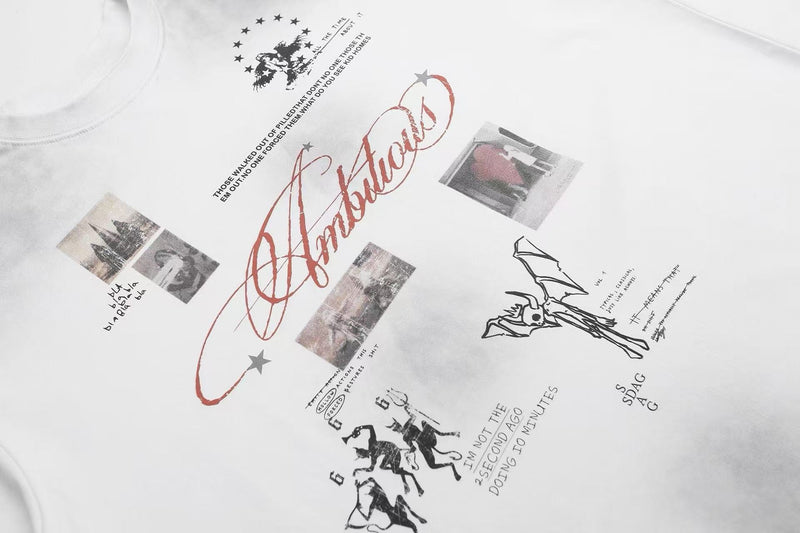 White graphic T-shirt with vintage collage prints, red script lettering, stars, and sketch-style artwork on the front
