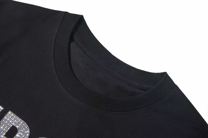 Black crew neck streetwear T-shirt with crystal rhinestone graphic detail on the chest and ribbed collar