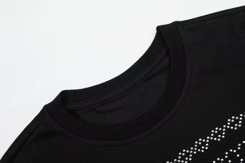 Black crew neck t-shirt with sparkling rhinestone horse graphic on the chest, styled for western streetwear