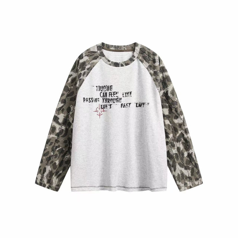 Front view of white raglan long sleeve T-shirt with camouflage sleeves and red chest graphic