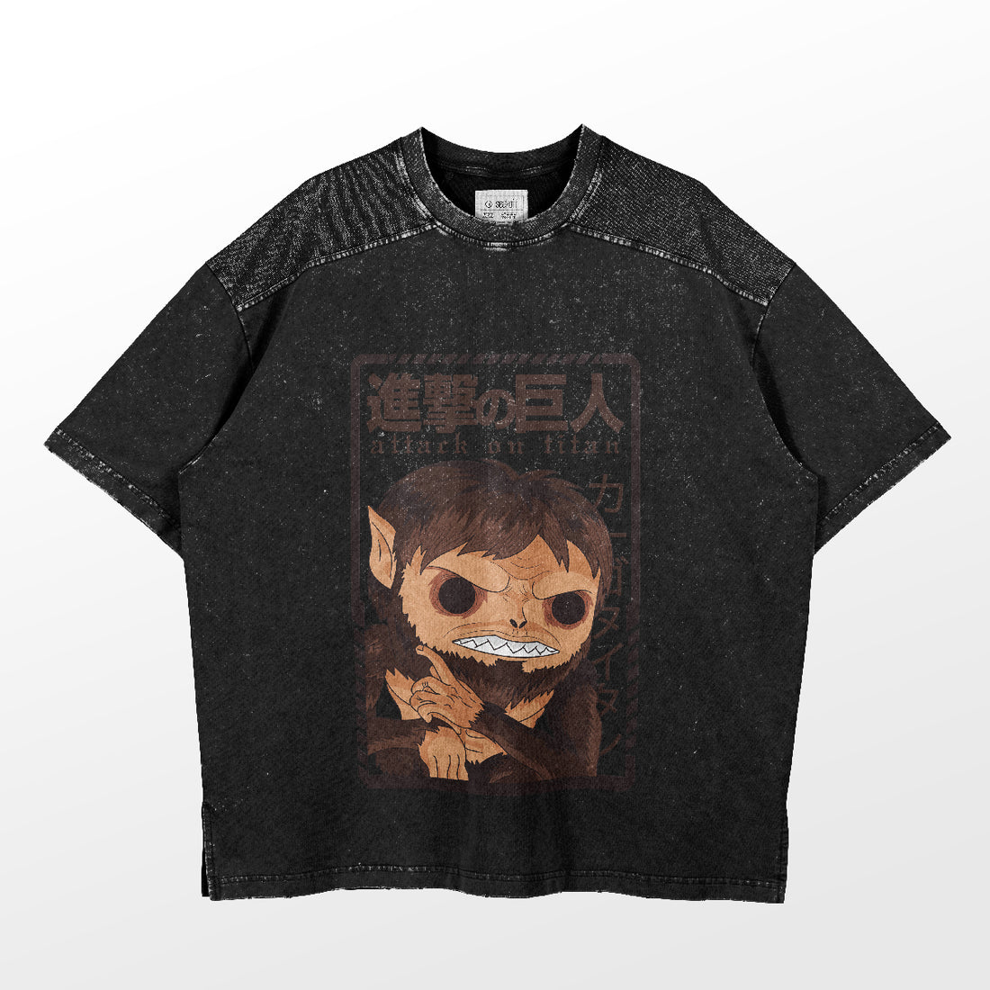 The Attack on Titan Beast Titan Funko Pop Style T-Shirt is black, shows a cartoonish Beast Titan-like character with fangs and a fierce look. Above is stylized text with Japanese characters, and the shirt has a distressed, vintage appearance.