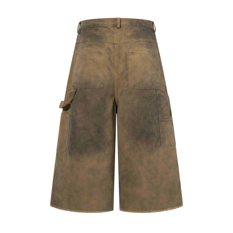 Back view of washed olive brown cargo shorts with large rear pockets and side cargo pocket