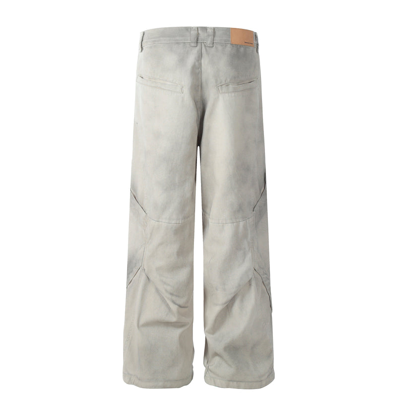 Back view of washed grey wide-leg utility pants with patch label
