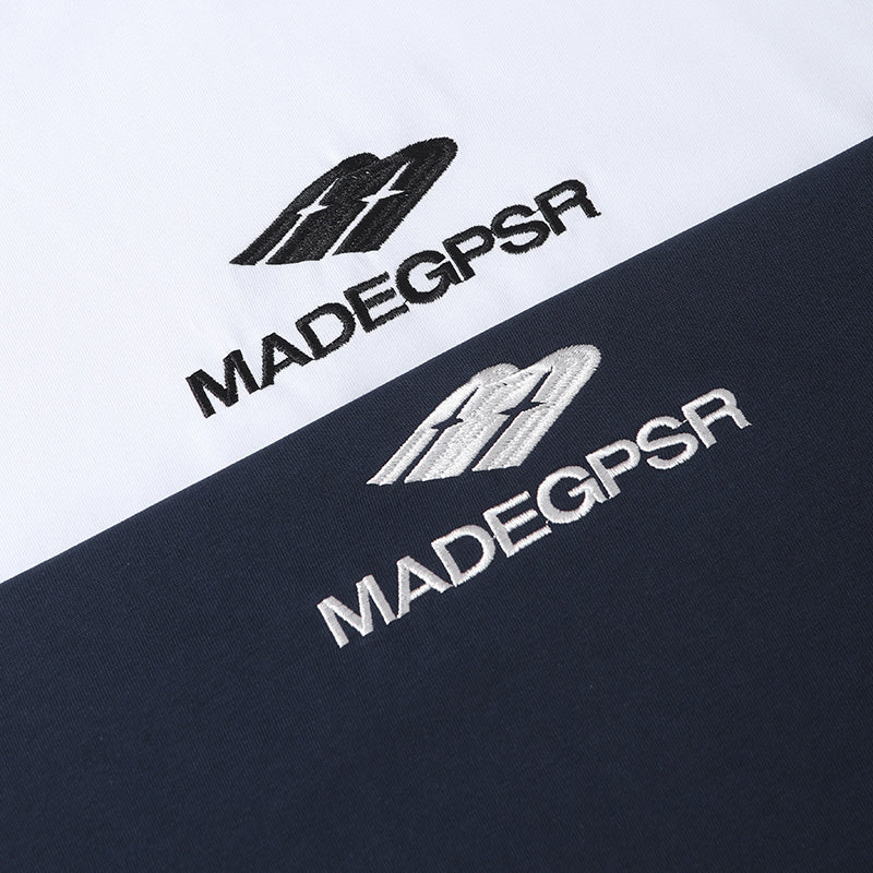 Close-up of black and white Seakoff Core Line cotton tees with bold MADEGPSR chest logo print