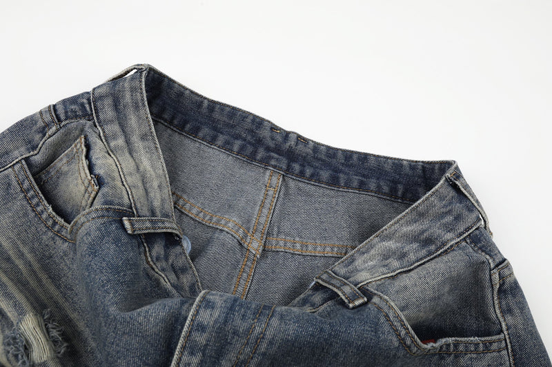 Close-up of inner waistband and fly area on blue vintage-wash jeans