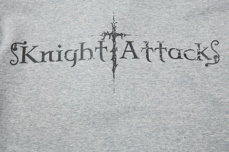 Gray graphic polo tee with distressed Knight Attack lettering and medieval sword-style cross design