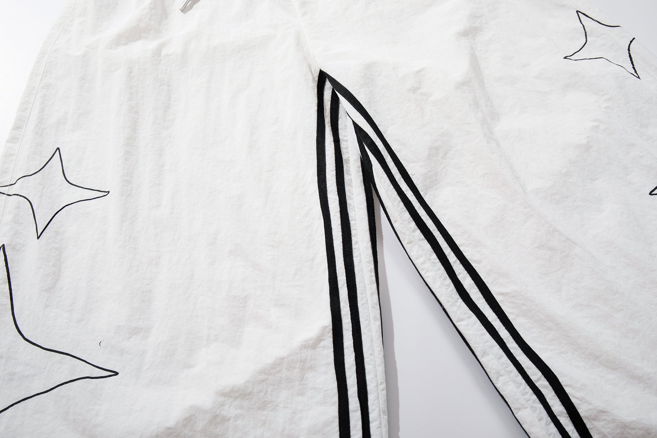 Omirad Starline Wide-Leg Track Pants | Star Graphic Streetwear