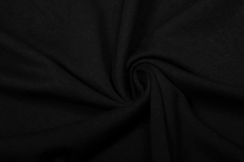 Close-up of gathered black fabric texture
