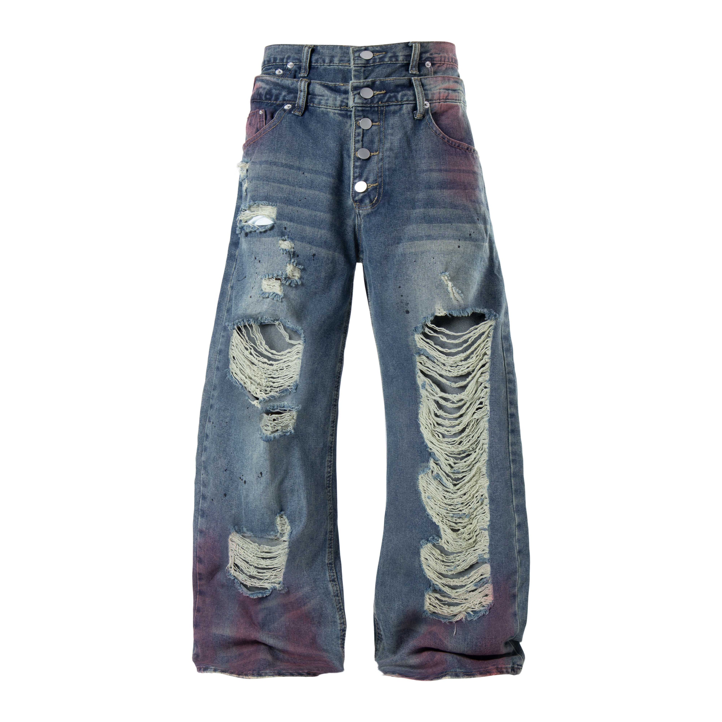 Front view of Omirad distressed wide-leg jeans with heavy knee rips, vintage blue wash, and purple-red color fade at hips
