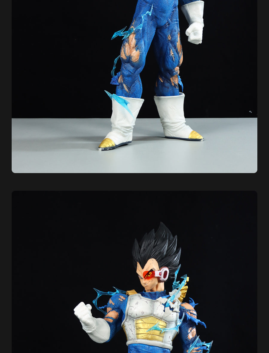 The Seakoff Vegeta Collectible Figure - Dragon Ball Z is a 45cm action figure featuring four interchangeable Super Saiyan heads, with spiky hair, a battle-damaged blue jumpsuit, white gloves and boots, and chest armor, complete with a red eyepiece accessory.