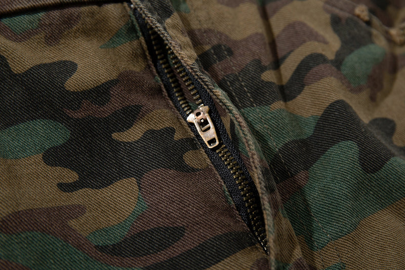 Close-up of zipper fly on woodland camo pants