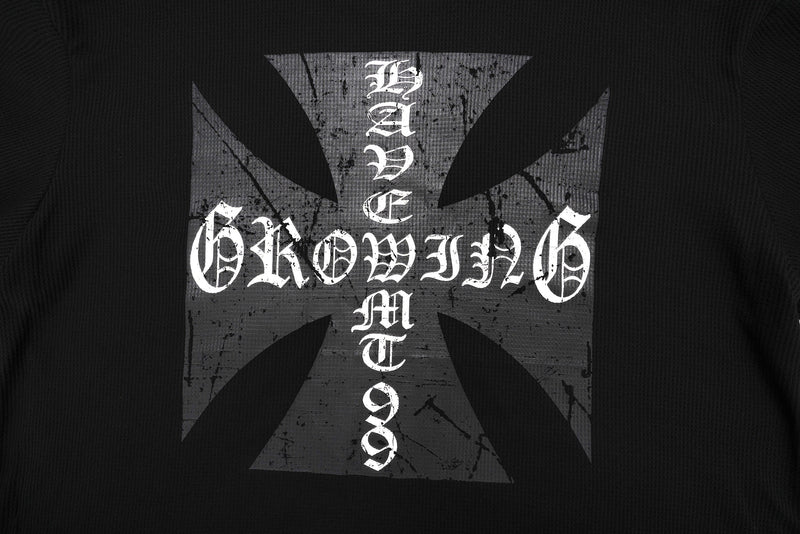 Close-up of back graphic on black tee with gothic cross and distressed white lettering